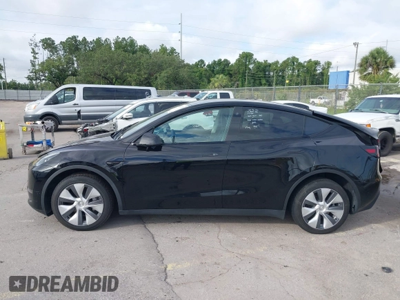 2023 Tesla Model Y Long Range with VIN 7SAYGDEE2PA044328, listed as a IAAI auction lot 42427625 with 41,324 mi miles and . Bid and sale history available at DreamBid. Image 14.