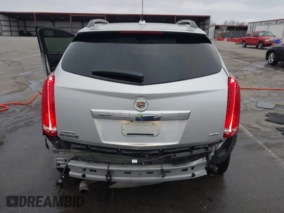 2016 Cadillac SRX Luxury Collection with VIN 3GYFNBE39GS550952, listed as a IAAI auction lot 40921325 with 90,160 mi miles. Bid and sale history available at carsss.com. Image 6.