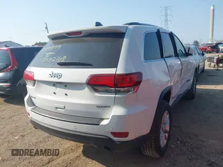 2021 Jeep Grand Cherokee Laredo X with VIN 1C4RJFAG7MC810278, listed as a IAAI auction lot 42482168 with 52,715 mi miles and . Bid and sale history available at DreamBid. Image 4.
