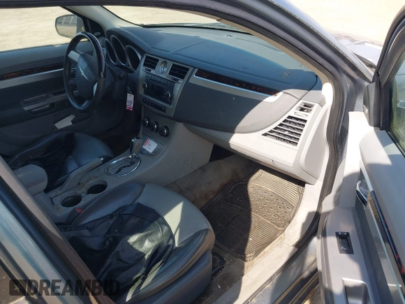 2007 Chrysler Sebring Limited z VIN 1C3LC66K57N578807, wystawiony jako IAAI lot #42190508 z przebiegiem 169 454 mil mil oraz . Historia ofert i sprzedaży dostępna na DreamBid. Obrazek 5.