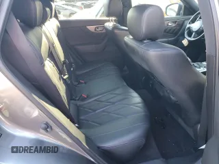2015 Infiniti QX70 z VIN JN8CS1MW2FM481841, wystawiony jako Copart lot #41459505 z przebiegiem Nie podano mil oraz Szkoda całkowita • Salvage title. Historia ofert i sprzedaży dostępna na DreamBid. Obrazek 11.