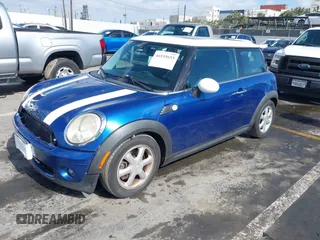 2009 MINI Hardtop with VIN WMWMF335X9TW71208, listed as a IAAI auction lot 41535653 with 148,660 mi miles and . Bid and sale history available at DreamBid. Image 2.