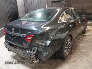 2018 Nissan Altima SR with VIN 1N4AL3AP9JC121415, listed as a IAAI auction lot 41528034 with 136,793 mi miles and . Bid and sale history available at carsss.com. Image 4.