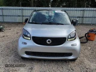 2016 Smart fortwo Passion z VIN WMEFJ5DA6GK057472, wystawiony jako Copart lot #74035244 z przebiegiem 67 826 mil mil oraz Szkoda całkowita • Salvage title. Historia ofert i sprzedaży dostępna na DreamBid. Obrazek 5.