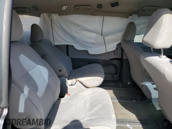 2017 Toyota Sienna L with VIN 5TDZZ3DC5HS818593, listed as a Copart auction lot 56942894 with 114,359 mi miles and Salvage Title. Bid and sale history available at DreamBid. Image 10.