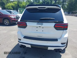 2019 Jeep Grand Cherokee Summit with VIN 1C4RJFJT1KC785744, listed as a IAAI auction lot 42645006 with 38,483 mi miles and . Bid and sale history available at DreamBid. Image 16.
