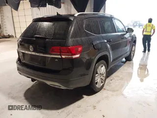 2019 Volkswagen Atlas SE with VIN 1V2WR2CA3KC603377, listed as a IAAI auction lot 42145332 with 137,553 mi miles and . Bid and sale history available at DreamBid. Image 4.