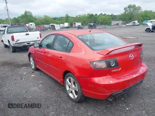 2005 Mazda 3 s with VIN JM1BK323351231181, listed as a IAAI auction lot 42181045 with 187,197 mi miles. Bid and sale history available at carsss.com. Image 3.