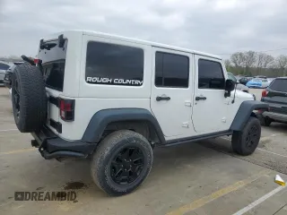 2013 Jeep Wrangler Unlimited Moab with VIN 1C4BJWEG6DL583841, listed as a Copart auction lot 52487915 with 130,369 mi miles and Salvage title. Bid and sale history available at DreamBid. Image 3.
