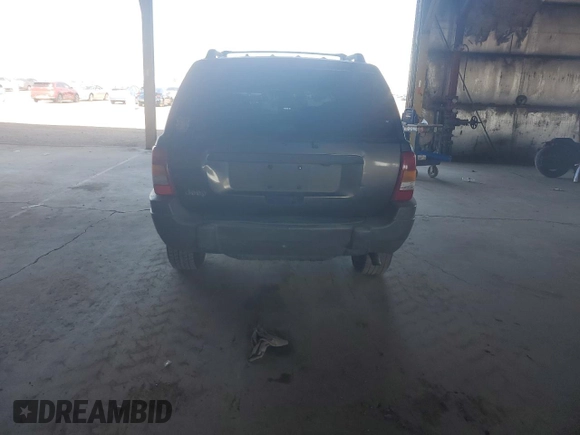 2000 Jeep Grand Cherokee Laredo with VIN 1J4GW48S0YC253091, listed as a Copart auction lot 60357255 with 218,410 mi miles and Clean title. Bid and sale history available at DreamBid. Image 6.