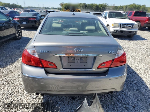2010 Infiniti M with VIN JN1CY0AP5AM911259, listed as a Copart auction lot 74220044 with 265,925 mi miles and Salvage Title. Bid and sale history available at DreamBid. Image 6.