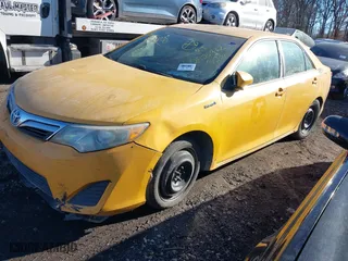 2012 Toyota Camry Hybrid XLE with VIN 4T1BD1FK1CU056792, listed as a IAAI auction lot 41436850 with 999,999 mi miles. Bid and sale history available at carsss.com. Image 17.