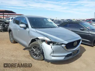 2020 Mazda CX-5 Touring with VIN JM3KFACM0L0772635, listed as a IAAI auction lot 41635115 with 120,285 mi miles. Bid and sale history available at carsss.com. Image 1.