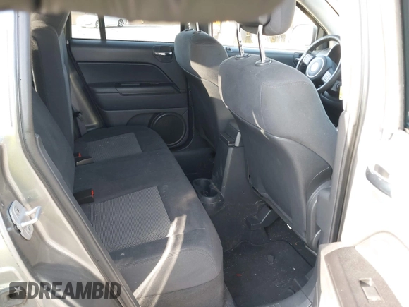 2011 Jeep Compass with VIN 1J4NT1FA4BD213994, listed as a IAAI auction lot 42020375 with 84,409 mi miles. Bid and sale history available at carsss.com. Image 8.