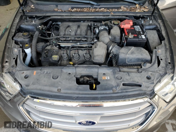 2013 Ford Taurus SEL z VIN 1FAHP2H84DG110704, wystawiony jako Copart lot #53538535 z przebiegiem 129 826 mil mil oraz Szkoda całkowita • Salvage title. Historia ofert i sprzedaży dostępna na DreamBid. Obrazek 11.