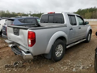 2016 Nissan Frontier S with VIN 1N6AD0EV4GN711059, listed as a Copart auction lot 47024135 with 152,452 mi miles and Salvage title. Bid and sale history available at DreamBid. Image 3.