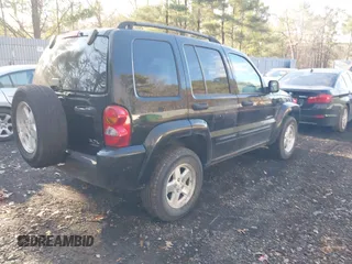 2004 Jeep Liberty Limited with VIN 1J4GL58K44W257636, listed as a IAAI auction lot 41429089 with 134,124 mi miles. Bid and sale history available at carsss.com. Image 4.