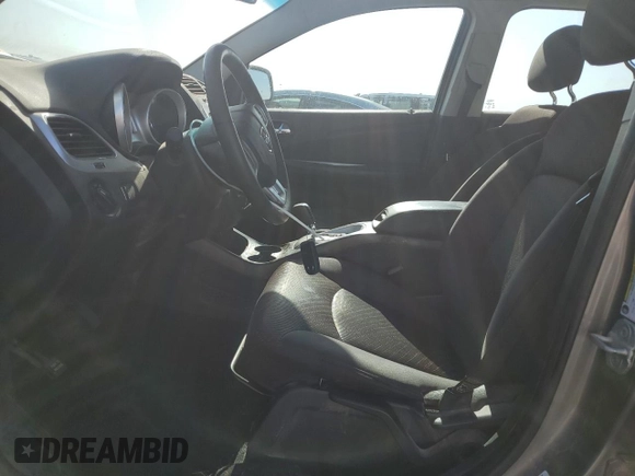 2013 Dodge Journey American Value with VIN 3C4PDCAB8DT590509, listed as a Copart auction lot 57347375 with 203,642 mi miles and Clean title. Bid and sale history available at DreamBid. Image 7.
