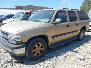 2005 Chevrolet Suburban LT z VIN 1GNEC16Z45J225720, wystawiony jako IAAI lot #41896970 z przebiegiem 347 315 mil mil oraz . Historia ofert i sprzedaży dostępna na DreamBid. Obrazek 2.