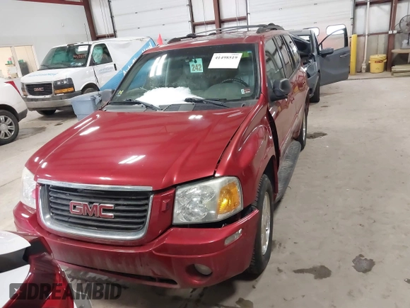 2003 GMC Envoy SLT with VIN 1GKDT13SX32134944, listed as a IAAI auction lot 41498519 with 149,640 mi miles. Bid and sale history available at carsss.com. Image 12.