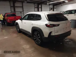 2023 Mazda CX-50 S Premium Plus with VIN 7MMVABEMXPN139186, listed as a IAAI auction lot 41289690 with 26,556 mi miles and . Bid and sale history available at DreamBid. Image 3.