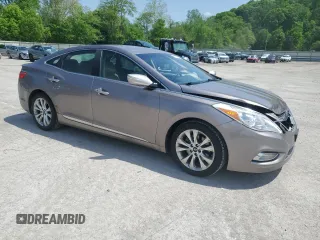 2013 Hyundai Azera z VIN KMHFG4JG4DA240690, wystawiony jako Copart lot #57465565 z przebiegiem 164 757 mil mil oraz Szkoda całkowita • Salvage title. Historia ofert i sprzedaży dostępna na DreamBid. Obrazek 4.