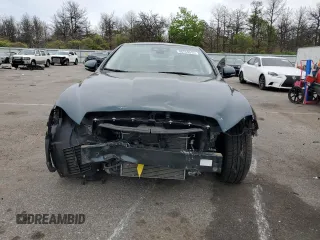 2018 Jaguar XJ Portfolio with VIN SAJWJ2GD9J8W15663, listed as a Copart auction lot 56734515 with 9,374 mi miles and Salvage Title. Bid and sale history available at DreamBid. Image 5.