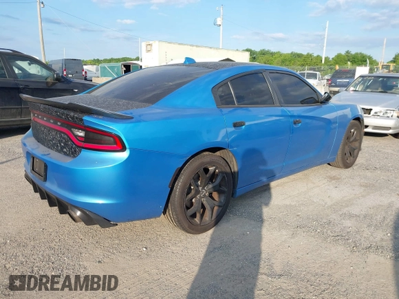 2015 Dodge Charger SXT with VIN 2C3CDXHG1FH848019, listed as a IAAI auction lot 42124399 with 175,247 mi miles and . Bid and sale history available at DreamBid. Image 4.