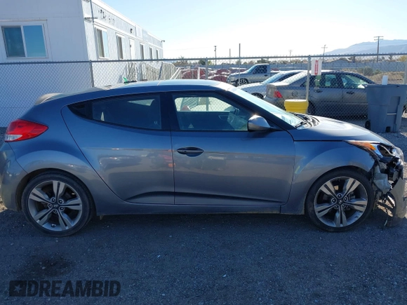 2017 Hyundai Veloster with VIN KMHTC6AD9HU323472, listed as a IAAI auction lot 41865974 with 94,692 mi miles. Bid and sale history available at carsss.com. Image 13.