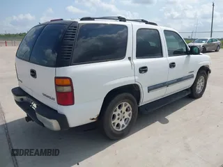 2002 Chevrolet Tahoe LS z VIN 1GNEC13Z42R214489, wystawiony jako IAAI lot #42438810 z przebiegiem 243 161 mil mil oraz . Historia ofert i sprzedaży dostępna na DreamBid. Obrazek 4.