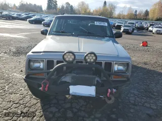 2000 Jeep Cherokee Police with VIN 1J4FF48S5YL195314, listed as a Copart auction lot 81909784 with 95,694 mi miles and Salvage Title. Bid and sale history available at carsss.com. Image 5.