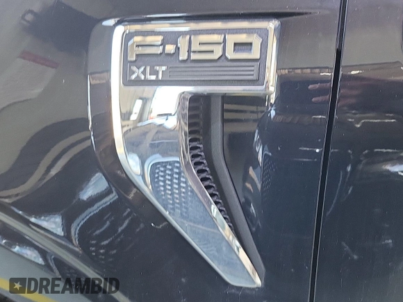 2021 Ford F-150 XL with VIN 1FTFW1E52MFB64744, listed as a IAAI auction lot 42733866 with 98,411 mi miles and . Bid and sale history available at DreamBid. Image 8.