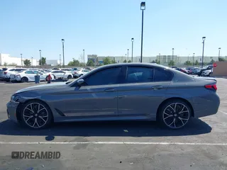 2021 BMW 5 Series M550i xDrive z VIN WBA13BK04MCF86288, wystawiony jako IAAI lot #41949946 z przebiegiem 40 944 mil mil oraz . Historia ofert i sprzedaży dostępna na DreamBid. Obrazek 14.