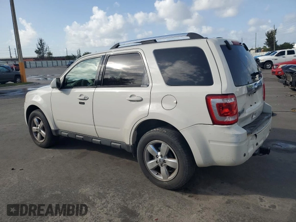 2012 Ford Escape Limited with VIN 1FMCU9EG3CKA34353, listed as a Copart auction lot 60621375 with 199,984 mi miles and Salvage title. Bid and sale history available at DreamBid. Image 2.
