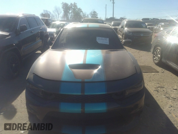 2023 Dodge Charger R/T with VIN 2C3CDXCT7PH576212, listed as a IAAI auction lot 41285793 with 37,471 mi miles and . Bid and sale history available at DreamBid. Image 12.
