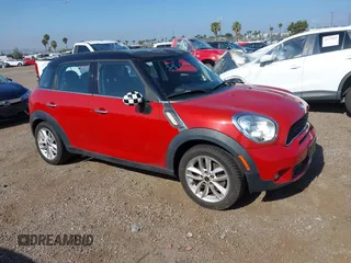 2013 MINI Countryman S z VIN WMWZC3C52DWP23887, wystawiony jako IAAI lot #42278143 z przebiegiem 63 625 mil mil oraz . Historia ofert i sprzedaży dostępna na DreamBid. Obrazek 1.