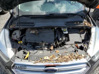 2017 Ford Escape SE z VIN 1FMCU0GDXHUE91333, wystawiony jako Copart lot #82061644 z przebiegiem Nie podano mil oraz Nie do naprawy • Non repairable. Historia ofert i sprzedaży dostępna na DreamBid. Obrazek 11.