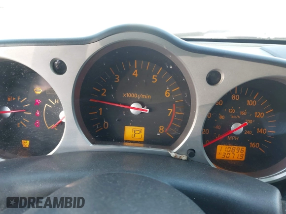 2005 Nissan 350Z Touring z VIN JN1AZ36A25M754869, wystawiony jako IAAI lot #41429477 z przebiegiem 110 896 mil mil oraz . Historia ofert i sprzedaży dostępna na DreamBid. Obrazek 7.