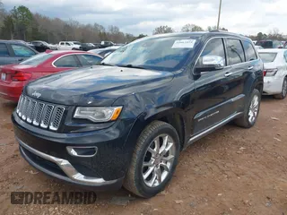 2015 Jeep Grand Cherokee Summit with VIN 1C4RJFJT1FC768707, listed as a IAAI auction lot 41863454 with 122,564 mi miles. Bid and sale history available at carsss.com. Image 2.