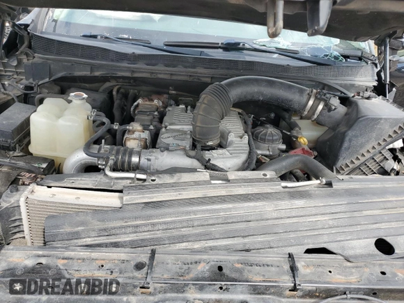 2016 Nissan Titan SL z VIN 1N6BA1F22GN504550, wystawiony jako Copart lot #56616955 z przebiegiem 176 020 mil mil oraz Szkoda całkowita • Salvage title. Historia ofert i sprzedaży dostępna na DreamBid. Obrazek 11.