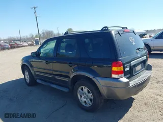 2006 Ford Escape XLT with VIN 1FMCU931X6KB64889, listed as a IAAI auction lot 41779430 with 202,177 mi miles. Bid and sale history available at carsss.com. Image 3.