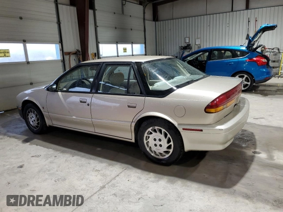 1995 Saturn SL with VIN 1G8ZK5271SZ238117, listed as a Copart auction lot 83723624 with 80,535 mi miles and Clean title. Bid and sale history available at DreamBid. Image 2.