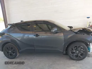 2021 Toyota C-HR LE with VIN JTNKHMBX5M1129253, listed as a IAAI auction lot 42169707 with 54,312 mi miles and . Bid and sale history available at DreamBid. Image 14.