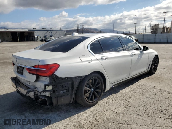 2018 BMW 7 Series 740e xDrive iPerformance with VIN WBA7J2C51JG938111, listed as a Copart auction lot 73361933 with 104,641 mi miles. Bid and sale history available at carsss.com. Image 3.