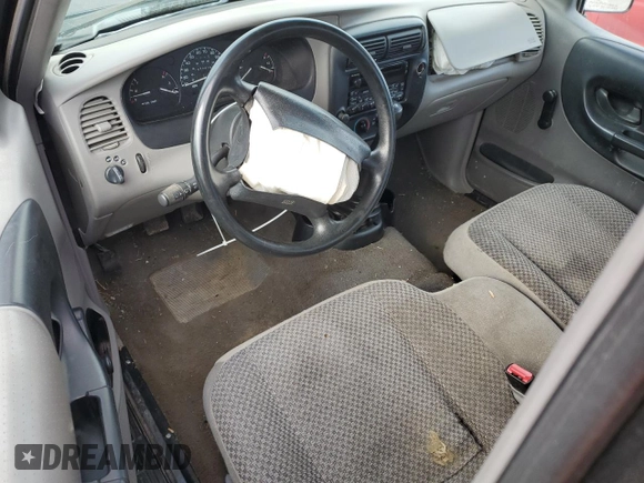 1999 Ford Ranger XL with VIN 1FTYR10C1XPB36812, listed as a Copart auction lot 54751214 with 277,416 mi miles and Salvage title. Bid and sale history available at DreamBid. Image 8.