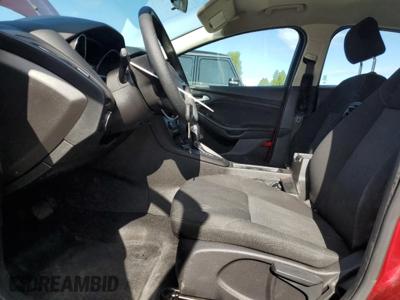 2015 Ford Focus SE with VIN 1FADP3F24FL386359, listed as a Copart auction lot 63519185 with 114,079 mi miles and Salvage title. Bid and sale history available at DreamBid. Image 7.