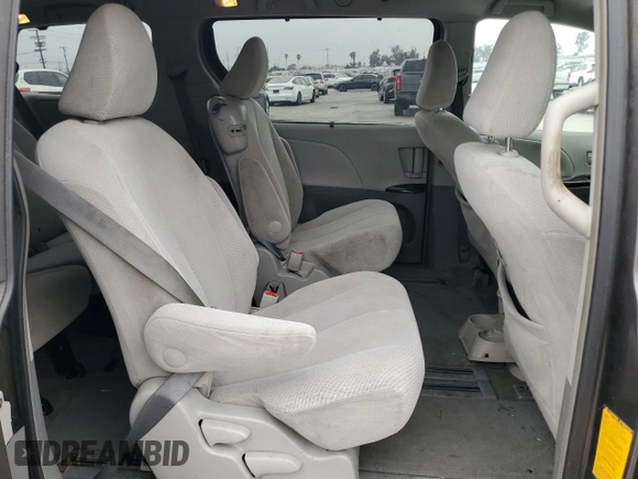 2012 Toyota Sienna LE AAS with VIN 5TDKK3DC0CS242667, listed as a Copart auction lot 65041005 with 196,322 mi miles and Clean title. Bid and sale history available at DreamBid. Image 11.