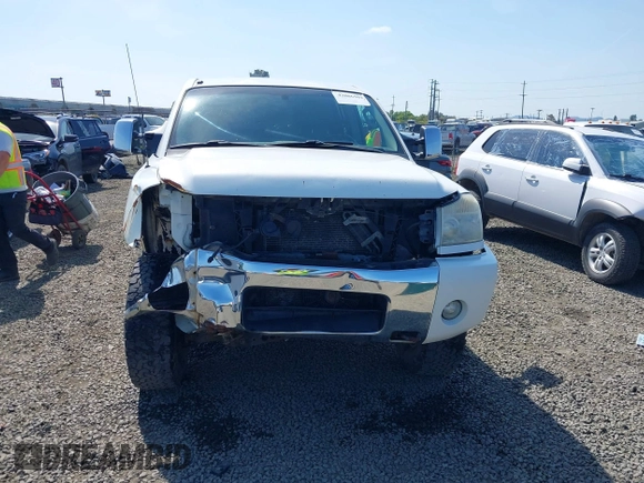 2005 Nissan Titan LE with VIN 1N6AA07B65N506688, listed as a IAAI auction lot 42086502 with 245,661 mi miles and . Bid and sale history available at DreamBid. Image 12.