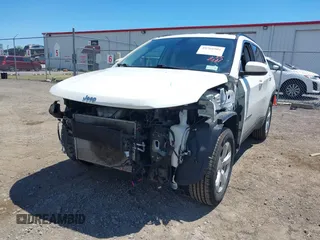 2020 Jeep Compass Latitude with VIN 3C4NJDBBXLT219466, listed as a IAAI auction lot 39766901 with 147,492 mi miles and . Bid and sale history available at DreamBid. Image 6.