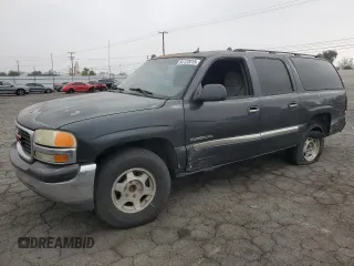 2005 GMC Yukon XL SLE z VIN 1GKEC16Z85J235096, wystawiony jako Copart lot #54122015 z przebiegiem 299 336 mil mil oraz Szkoda całkowita • Salvage title. Historia ofert i sprzedaży dostępna na DreamBid. Obrazek 1.